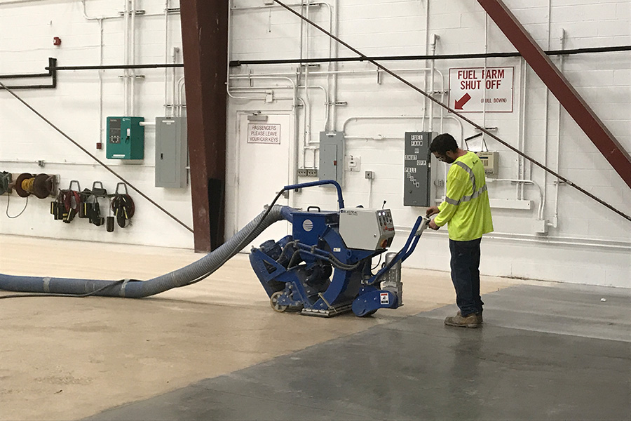 NuFlorz worker installing floor